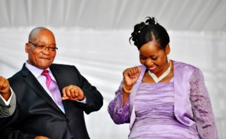 In this photo, taken on April 20, 2012, President Jacob Zuma and his fiance, Ms Bongi Ngema, dance at his home in Nkandla, KwaZulu Natal.  (Source: afp/Elmond Jiyane)
