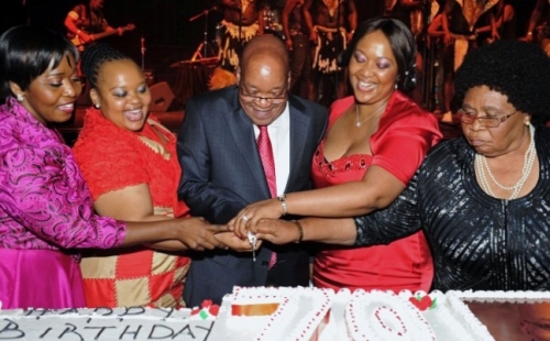 President Jacob Zuma and his current wives cutting his birthday cake (source: thepromota.co.uk)